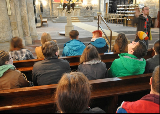 Students giving a lecture in church