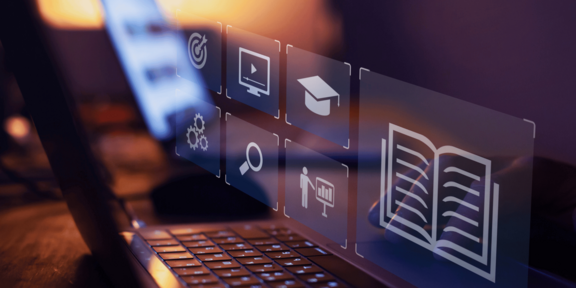 Laptop-Tastatur mit schwebenden Symbolen für Zielscheibe, Video, Abschlusskappe, Zahnräder, Lupe, Präsentation und aufgeschlagenes Buch