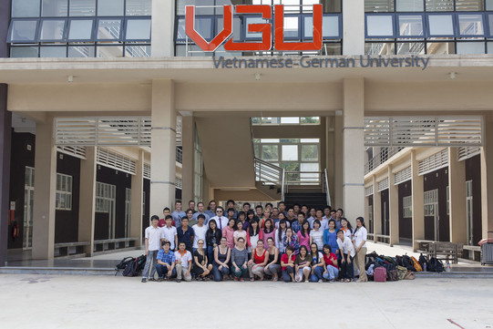 Group photo in front of "Vietnamese German University"