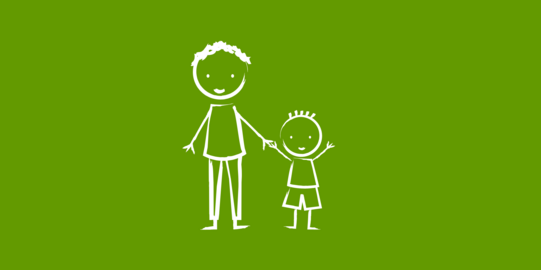 A larger person and a small child are walking next to each other.