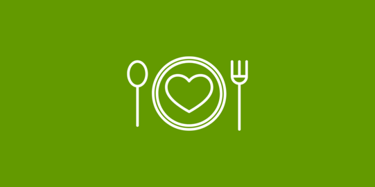 It shows a plate with a knife and a fork. In the middle of the plate is a heart