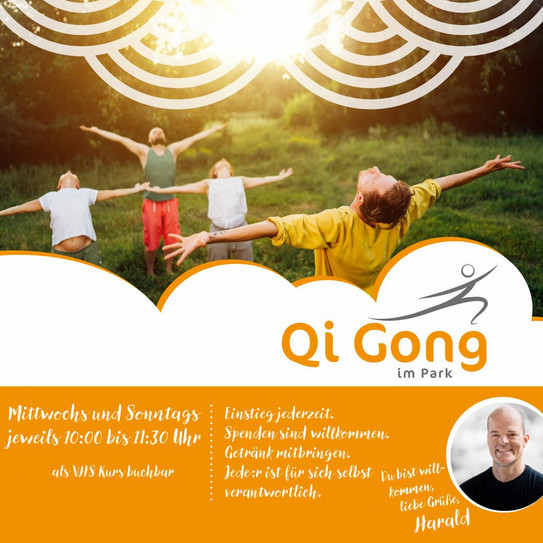 Group of four people practicing Qi Gong in a park with arms outstretched, including a man in red pants and a child in a yellow shirt.