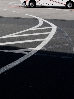 Road with white car