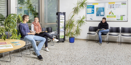 Students sitting in the waiting area of the Central Student Advisory Service